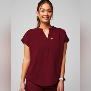 Fabletics Evolve 3-Pocket Scrub Top and matching Ion scrub pants in Wine